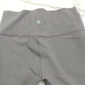 Lululemon tights with mesh cut outs. Size 10. Used